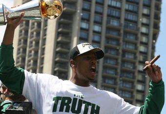 BOSTON - JUNE 19:  Paul Pierce of the Boston Celtic holds his MVP trophy during the Boston Celtics Victory Parade on June 19, 2008 in Boston, Massachusettes. (Photo by Elsa/Getty Images)