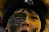 WEST LAFAYETTE, IN - SEPTEMBER 20: A Purdue fan cheers during play against the Central Michigan Chippewas at Ross-Ade Stadium on September 20, 2008 in West Lafayette, Indiana. (Photo by Ronald Martinez/Getty Images)