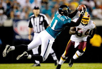 JACKSONVILLE, FL - SEPTEMBER 03:  Mike Sims-Walker #11 of the Jacksonville Jaguars makes a reception during the game against the Washington Redskins at Jacksonville Municipal Stadium on September 3, 2009 in Jacksonville, Florida.  (Photo by Sam Greenwood/Getty Images)