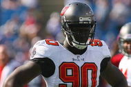 ORCHARD PARK, NY - SEPTEMBER 20:  Defensive end Gaines Adams #90 of the Tampa Bay Buccaneers takes a break from the action during the game against the Buffalo Bills at Ralph Wilson Stadium on September 20, 2009 in Orchard Park, New York.  The Bills won 33-20.  (Photo by Rick Stewart/Getty Images)