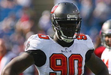 ORCHARD PARK, NY - SEPTEMBER 20:  Defensive end Gaines Adams #90 of the Tampa Bay Buccaneers takes a break from the action during the game against the Buffalo Bills at Ralph Wilson Stadium on September 20, 2009 in Orchard Park, New York.  The Bills won 33-20.  (Photo by Rick Stewart/Getty Images)