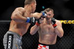 DALLAS - SEPTEMBER 19:  UFC fighter Junior Dos Santos (L) battles UFC fighter Mirko Cro Cop (R) during their Heavyweight bout at UFC 103: Franklin vs. Belfort at the American Airlines Center on September 19, 2009 in Dallas, Texas.  (Photo by Jon Kopaloff/Getty Images)