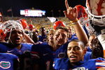BATON ROUGE, LA - OCTOBER 10:  Quarterback Tim Tebow #15 of the Florida Gators celebrates their 13-3 win over the Louisiana State University Tigers with his teammates at Tiger Stadium on October 10, 2009 in Baton Rouge, Louisiana.  (Photo by Kevin C. Cox/Getty Images)