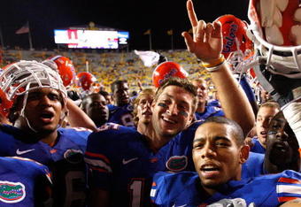 BATON ROUGE, LA - OCTOBER 10:  Quarterback Tim Tebow #15 of the Florida Gators celebrates their 13-3 win over the Louisiana State University Tigers with his teammates at Tiger Stadium on October 10, 2009 in Baton Rouge, Louisiana.  (Photo by Kevin C. Cox/Getty Images)
