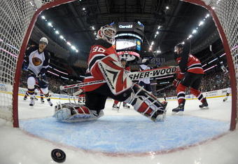 NEWARK, NJ - OCTOBER 16: Nik Antropov #80 watches a shot by Rich Peverley #47 (not shown) of the Atlanta Thrashers go in the net at 14:57 of the second period against Martin Brodeur #30 of the New Jersey Devils at the Prudential Center on October 16, 2009 in Newark, New Jersey. The Thrashers defeated the Devils 4-2. (Photo by Bruce Bennett/Getty Images)