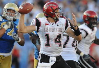 PASADENA, CA - SEPTEMBER 05:   Ryan Lindley #14 of the San Diego State Aztecs looks to pass the ball during the game against the UCLA Bruins at The Rose Bowl on September 5, 2009 in Pasadena, California.  (Photo by Lisa Blumenfeld/Getty Images)