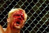 26 Oct 2001:  Jeff Jarrett feels the pain during the cage fight bout during the WWA Wrestling 'Inception'  fight night held at the Sydney Superdome, Sydney, Australia.  DIGITAL IMAGE Mandatory Credit: Chris McGrath/ALLSPORT