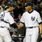 NEW YORK - OCTOBER 16:  Mariano Rivera #42 of the New York Yankees shakes hands with Jorge Posada #20 after defeating the Los Angeles Angels of Anaheim 4-1 in the ninth inning of Game One of the ALCS during the 2009 MLB Playoffs at Yankee Stadium on October 16, 2009 in New York, New York.  (Photo by Jim McIsaac/Getty Images)
