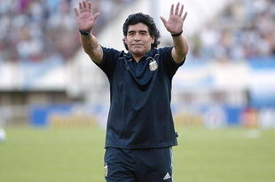 BUENOS AIRES, BUENOS AIRES - MARCH 28: Argentine manager Diego Maradona waves to the fans prior to the 2010 FIFA World Cup South African qualifier match between Argentina and Venezuela at River Plate Stadium on March 28, 2009 in Buenos Aires, Argentina.  (Photo by Photogamma/Getty Images)