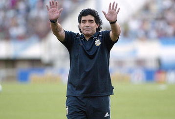 BUENOS AIRES, BUENOS AIRES - MARCH 28: Argentine manager Diego Maradona waves to the fans prior to the 2010 FIFA World Cup South African qualifier match between Argentina and Venezuela at River Plate Stadium on March 28, 2009 in Buenos Aires, Argentina.  (Photo by Photogamma/Getty Images)