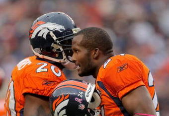 DENVER - OCTOBER 04:  Defensive backs Brian Dawkins #20 and Champ Bailey #24 of the Denver Broncos converse during the final drive by the Dallas Cowboys during NFL action at Invesco Field at Mile High on October 4, 2009 in Denver, Colorado. The Broncos defeated the Cowboys 17-10.  (Photo by Doug Pensinger/Getty Images)