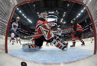 NEWARK, NJ - OCTOBER 16: Nik Antropov #80 watches a shot by Rich Peverley #47 (not shown) of the Atlanta Thrashers go in the net at 14:57 of the second period against Martin Brodeur #30 of the New Jersey Devils at the Prudential Center on October 16, 2009 in Newark, New Jersey. The Thrashers defeated the Devils 4-2. (Photo by Bruce Bennett/Getty Images)