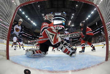 NEWARK, NJ - OCTOBER 16: Nik Antropov #80 watches a shot by Rich Peverley #47 (not shown) of the Atlanta Thrashers go in the net at 14:57 of the second period against Martin Brodeur #30 of the New Jersey Devils at the Prudential Center on October 16, 2009 in Newark, New Jersey. The Thrashers defeated the Devils 4-2. (Photo by Bruce Bennett/Getty Images)