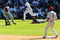 LOS ANGELES, CA - OCTOBER 16:  Ronnie Belliard #3 of the Los Angeles Dodgers bunts the ball for a single as Chan Ho Park #61 of the Philadelphia Phillies dives for the ball during Game Two of the NLCS during the 2009 MLB Playoffs at Dodger Stadium on October 16, 2009 in Los Angeles, California.  (Photo by Kevork Djansezian/Getty Images)
