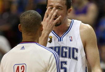 ORLANDO, FL - JUNE 14:  Hedo Turkoglu #15 of the Orlando Magic discusses a call with referee Dan Crawford in the first half against the Los Angeles Lakers in Game Five of the 2009 NBA Finals on June 14, 2009 at Amway Arena in Orlando, Florida.  NOTE TO USER:  User expressly acknowledges and agrees that, by downloading and or using this photograph, User is consenting to the terms and conditions of the Getty Images License Agreement.  (Photo by Elsa/Getty Images)