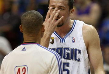 ORLANDO, FL - JUNE 14:  Hedo Turkoglu #15 of the Orlando Magic discusses a call with referee Dan Crawford in the first half against the Los Angeles Lakers in Game Five of the 2009 NBA Finals on June 14, 2009 at Amway Arena in Orlando, Florida.  NOTE TO USER:  User expressly acknowledges and agrees that, by downloading and or using this photograph, User is consenting to the terms and conditions of the Getty Images License Agreement.  (Photo by Elsa/Getty Images)