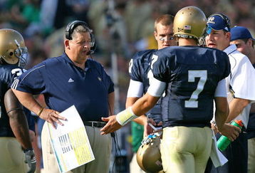 SOUTH BEND, IN - SEPTEMBER 19: Head coach Charlie Weis of the Notre Dame Fighting Irish talks with quarterback Jimmy Clausen #7 during a game against the Michigan State Spartans on September 19, 2009 at Notre Dame Stadium in South Bend, Indiana. (Photo by Jonathan Daniel/Getty Images)