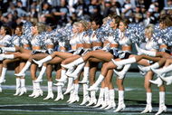 OAKLAND, CA - JANUARY 1:  The Raiderettes preform their routine during the game between the Baltimore Ravens and the Oakland Raiders at the Network Associates Coliseum in Oakland, California on January 14, 2001. The Ravens defeated the Raiders 16-3. (Photo by:  Tom Hauck/Getty Images)