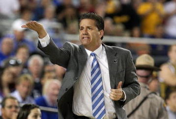 GLENDALE, AZ - MARCH 26:  Head Coach John Calipari of the Memphis Tigers adjusts his team against the Missouri Tigers in the Sweet 16 of the NCAA Division I Men's Basketball Tournament at the University of Phoenix Stadium on March 26, 2009 in Glendale, Arizona.  (Photo by Ronald Martinez/Getty Images)