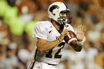 AUSTIN, TX - SEPTEMBER 5:  Quarterback Trey Revell #12 of the Louisiana Monroe Warhawks looks to make a pass play against the Texas Longhorns during their game on September 5, 2009 at Darrell K Royal-Texas Memorial Stadium in Austin, Texas. The Longhorns defeated the Warhawks 59-20. (Photo by Brian Bahr/Getty Images)