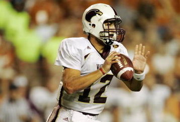 AUSTIN, TX - SEPTEMBER 5:  Quarterback Trey Revell #12 of the Louisiana Monroe Warhawks looks to make a pass play against the Texas Longhorns during their game on September 5, 2009 at Darrell K Royal-Texas Memorial Stadium in Austin, Texas. The Longhorns defeated the Warhawks 59-20. (Photo by Brian Bahr/Getty Images)