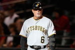 PHOENIX - JULY 25:  First base coach Perry Hill #6 of the Pittsburgh Pirates during the major league baseball game against the Arizona Diamondbacks at Chase Field on July 25, 2009 in Phoenix, Arizona. The Diamondbacks defeated the Pirates 7-0.  (Photo by Christian Petersen/Getty Images)