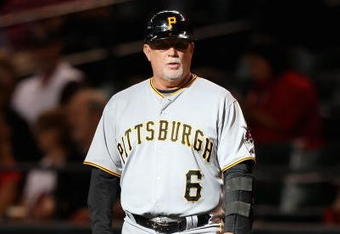 PHOENIX - JULY 25:  First base coach Perry Hill #6 of the Pittsburgh Pirates during the major league baseball game against the Arizona Diamondbacks at Chase Field on July 25, 2009 in Phoenix, Arizona. The Diamondbacks defeated the Pirates 7-0.  (Photo by Christian Petersen/Getty Images)