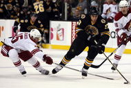 BOSTON - MARCH 05:  Milan Lucic #17 of the Boston Bruins tries to get around Matthew Lombardi #15 of the Phoenix Coyotes on March 5, 2009 at the TD Banknorth Garden in Boston, Massachusetts. The Coyotes defeated the Bruins 2-1.  (Photo by Elsa/Getty Images)