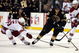 BOSTON - MARCH 05:  Milan Lucic #17 of the Boston Bruins tries to get around Matthew Lombardi #15 of the Phoenix Coyotes on March 5, 2009 at the TD Banknorth Garden in Boston, Massachusetts. The Coyotes defeated the Bruins 2-1.  (Photo by Elsa/Getty Images)