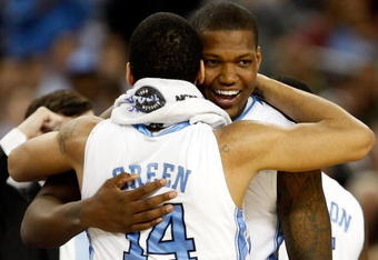 DETROIT - APRIL 06:  Deon Thompson #21 and Danny Green #14 of the North Carolina Tar Heels celebrate after the Tar Heels 89-72 win against the Michigan State Spartans during the 2009 NCAA Division I Men's Basketball National Championship game at Ford Field on April 6, 2009 in Detroit, Michigan. Ginyard used a medical red-shirt this season after injury.  (Photo by Streeter Lecka/Getty Images)