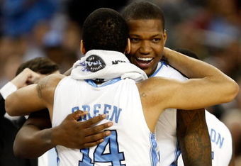 DETROIT - APRIL 06:  Deon Thompson #21 and Danny Green #14 of the North Carolina Tar Heels celebrate after the Tar Heels 89-72 win against the Michigan State Spartans during the 2009 NCAA Division I Men's Basketball National Championship game at Ford Field on April 6, 2009 in Detroit, Michigan. Ginyard used a medical red-shirt this season after injury.  (Photo by Streeter Lecka/Getty Images)