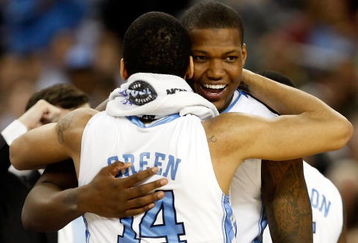 DETROIT - APRIL 06:  Deon Thompson #21 and Danny Green #14 of the North Carolina Tar Heels celebrate after the Tar Heels 89-72 win against the Michigan State Spartans during the 2009 NCAA Division I Men's Basketball National Championship game at Ford Field on April 6, 2009 in Detroit, Michigan. Ginyard used a medical red-shirt this season after injury.  (Photo by Streeter Lecka/Getty Images)