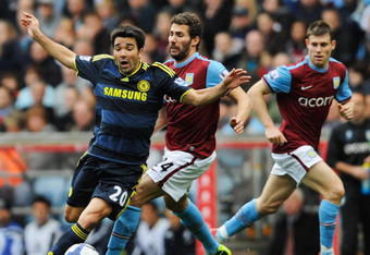BIRMINGHAM, UNITED KINGDOM - OCTOBER 17:  Deco of Chelsea takes on Carlos Cuellar Aston Villa during the Barclays Premier League match between Aston Villa and Chelsea at Villa Park on October 17, 2009 in Birmingham, England.  (Photo by Michael Regan/Getty Images)