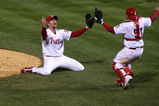 PHILADELPHIA - OCTOBER 29:  Brad Lidge #54 (L) and Carlos Ruiz #51 of the Philadelphia Phillies celebrate the final out of their 4-3 win to win the World Series against the Tampa Bay Rays during the continuation of game five of the 2008 MLB World Series on October 29, 2008 at Citizens Bank Park in Philadelphia, Pennsylvania.  (Photo by Jim McIsaac/Getty Images)
