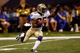 NEW ORLEANS - SEPTEMBER 13:  Reggie Bush #25 of the New Orleans Saints during the game against the Detroit Lions at the Louisiana Superdome on September 13, 2009 in New Orleans, Louisiana.  (Photo by Chris Graythen/Getty Images)