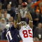 GLENDALE, AZ - FEBRUARY 03:  David Tyree #85 of the New York Giants catches a 32-yard pass from Eli Manning #10 as Rodney Harrison #37 of the New England Patriots attempts to knock it out in the fourth quarter of Super Bowl XLII on February 3, 2008 at the University of Phoenix Stadium in Glendale, Arizona.  (Photo by Donald Miralle/Getty Images)