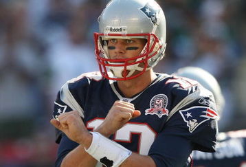 EAST RUTHERFORD, NJ - SEPTEMBER 20:  Tom Brady #12 of the New England Patriots gestures against the New York Jets at Giants Stadium on September 20, 2009 in East Rutherford, New Jersey.  (Photo by Nick Laham/Getty Images)