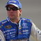 FONTANA, CA - OCTOBER 09:  David Reutimann, driver of the #00 Aaron's Dream Machine Toyota sits on pit wall during qualifying for the NASCAR Sprint Cup Series Pepsi 500 at Auto Club Speedway on October 9, 2009 in Fontana, California.  (Photo by Jason Smith/Getty Images)