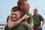 TERNATE, PHILIPPINES - FEBRUARY 24:  U.S. Marine Corps Cpl. Cody Quinney of Lexington, TX demonstrates a choke hold on a fellow Echo 26 company member on February 24, 2004 at the Philippines Marine training camp in Ternante, Philippines. 2,652 U.S. military personnel are in the Philippines to participate in 'Balikatan 04,' a two week training exercise with their Filipino counterparts aimed at combat readiness and interoperability. (Photo by David Greedy/Getty Images)