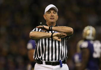 SEATTLE - SEPTEMBER 5:  Referee Michael Batlan makes a call during the game between the LSU Tigers and the Washington Huskies on September 5, 2009 at Husky Stadium in Seattle, Washington. The LSU Tigers defeated the Washington Huskies 31-23. (Photo by Otto Greule Jr/Getty Images)
