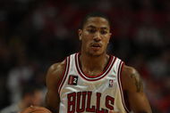 CHICAGO - APRIL 26: Derrick Rose #1 of the Chicago Bulls brings the ball upcourt against the Boston Celtics in Game Four of the Eastern Conference Quarterfinals during the 2009 NBA Playoffs at the United Center on April 26, 2009 in Chicago, Illinois. The Bulls defeated the Celtics 121-118 in double overtime. NOTE TO USER: User expressly acknowledges and agreees that, by downloading and/or using this Photograph, User is consenting to the terms and conditions of the Getty Images License Agreement. (Photo by Jonathan Daniel/Getty Images)