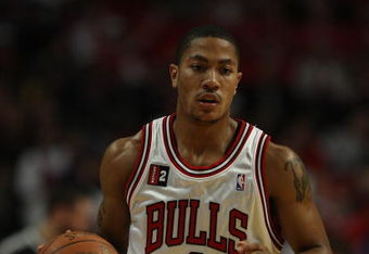 CHICAGO - APRIL 26: Derrick Rose #1 of the Chicago Bulls brings the ball upcourt against the Boston Celtics in Game Four of the Eastern Conference Quarterfinals during the 2009 NBA Playoffs at the United Center on April 26, 2009 in Chicago, Illinois. The Bulls defeated the Celtics 121-118 in double overtime. NOTE TO USER: User expressly acknowledges and agreees that, by downloading and/or using this Photograph, User is consenting to the terms and conditions of the Getty Images License Agreement. (Photo by Jonathan Daniel/Getty Images)