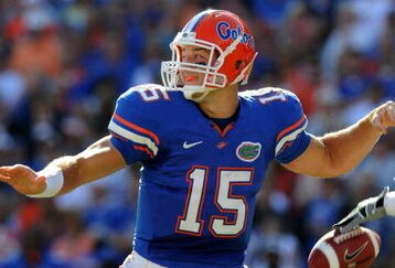 GAINESVILLE, FL - OCTOBER 17: Quarterback Tim Tebow #15 of the Florida Gators fumbles before passing in the first quarter against the University of Arkansas Razorbacks October 17, 2009 at Ben Hill Griffin Stadium in Gainesville, Florida.  (Photo by Al Messerschmidt/Getty Images)