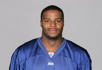 EAST RUTHERFORD, NJ - 2009:  Osi Umenyiora of the New York Giants poses for his 2009 NFL headshot at photo day in East Rutherford, New Jersey.  (Photo by NFL Photos)  