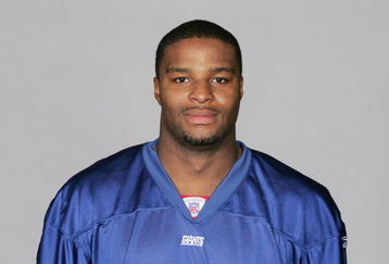 EAST RUTHERFORD, NJ - 2009:  Osi Umenyiora of the New York Giants poses for his 2009 NFL headshot at photo day in East Rutherford, New Jersey.  (Photo by NFL Photos)  