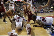 AUBURN HILLS, MI - APRIL 26: Will Bynum #12 of the Detroit Pistons tries to pass to a teammate but his foot was out of bounds in front of Delonte West #13 of the Cleveland Cavaliers in Game Four of the Eastern Conference Quarterfinals during the 2009 NBA Playoffs at the Palace of Auburn Hills on April 26, 2009 in Auburn Hills, Michigan. NOTE TO USER: User expressly acknowledges and agrees that, by downloading and or using this photograph, User is consenting to the terms and conditions of the Getty Images License Agreement. (Photo by Gregory Shamus/Getty Images)