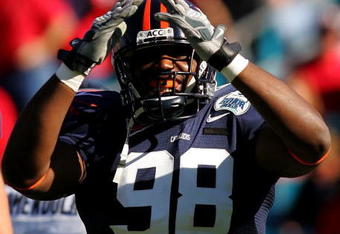 JACKSONVILLE, FL - JANUARY 01:  Nate Collins #98 of the Virginia Cavaliers celebrates a safety during the Gator Bowl against the Texas Tech Red Raiders at Jacksonville Municipal Stadium on January 1, 2008 in Jacksonville, Florida.  (Photo by Sam Greenwood/Getty Images)
