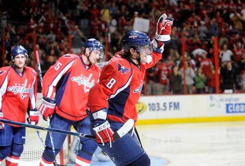 WASHINGTON - OCTOBER 15:  Alex Ovechkin #8 of the Washington Capitals celebrates after scoring in the second period against the San Jose Sharks at the Verizon Center on October 15, 2009 in Washington, DC.  (Photo by Greg Fiume/Getty Images)