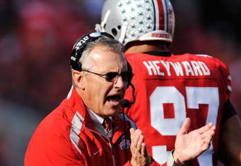 COLUMBUS, OH - OCTOBER 10:  Head coach Jim Tressel of the Ohio State Buckeyes celebrates after the Buckeyes scored a touchdown against the Wisconsin Badgers at Ohio Stadium on October 10, 2009 in Columbus, Ohio.  (Photo by Jamie Sabau/Getty Images)