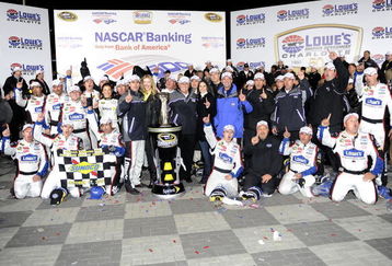 CONCORD, NC - OCTOBER 17:  Jimmie Johnson, driver of the #48 Lowe's Chevrolet, celebrates with his team after winning the NASCAR Sprint Cup Series NASCAR Banking 500 at Lowe's Motor Speedway on October 17, 2009 in Concord, North Carolina.  (Photo by John Harrelson/Getty Images for NASCAR)